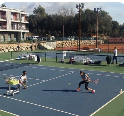 Tennis player hitting a backhand